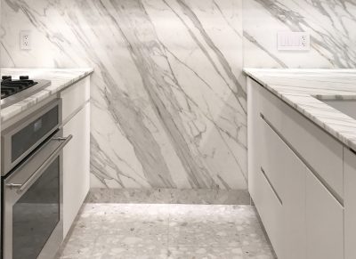 STADT Architecture, Chelsea Pied-à-terre, kitchen, calcatta gold marble, nyc architects